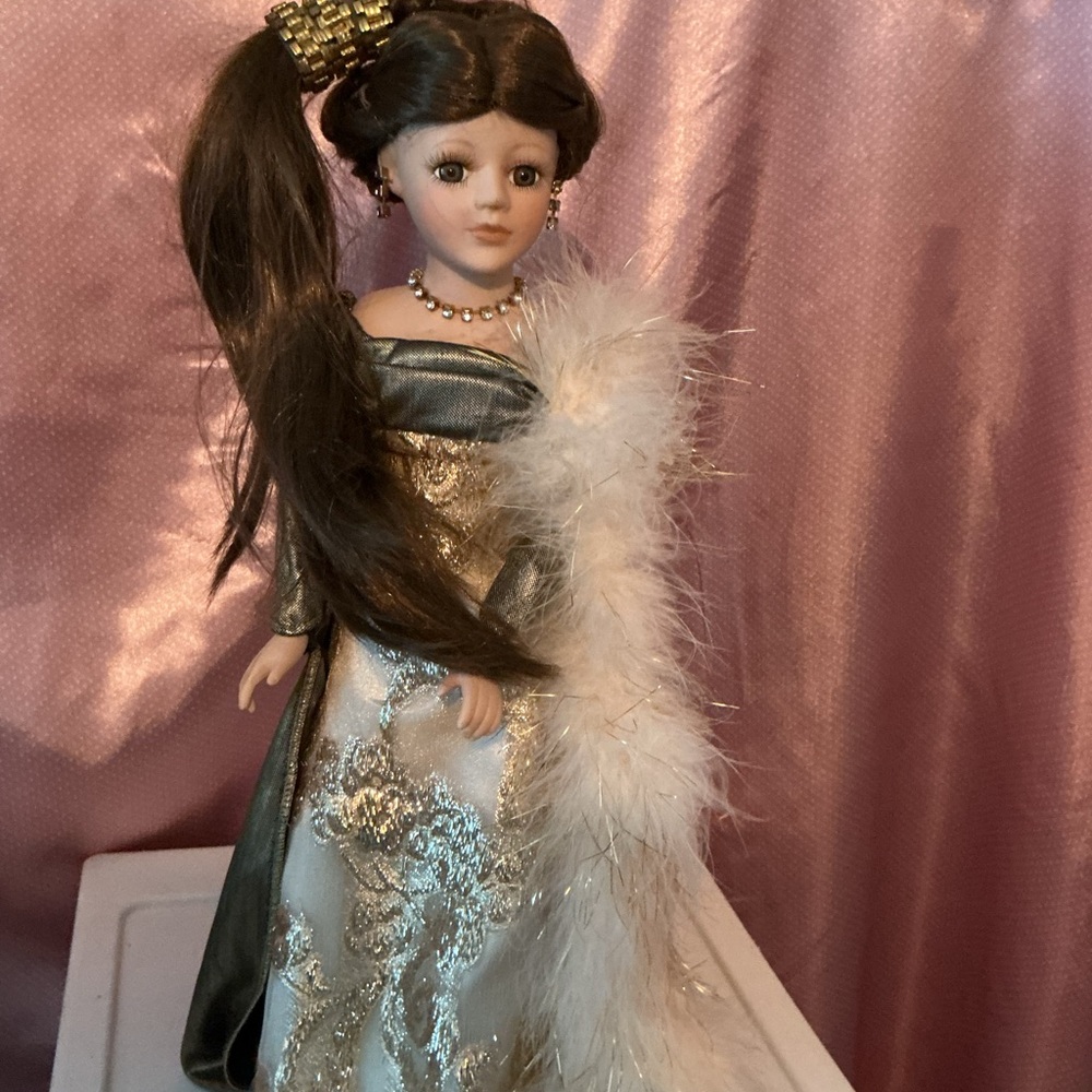 Elegant Doll with Feathered Gown
